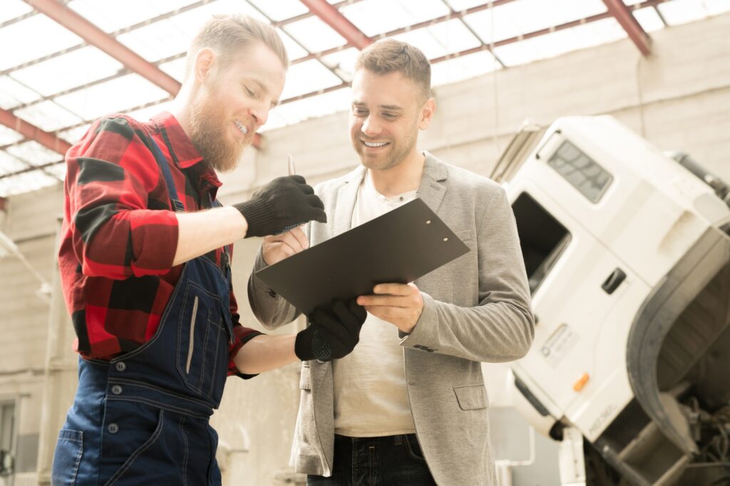 Happy Men In Auto Repair Service