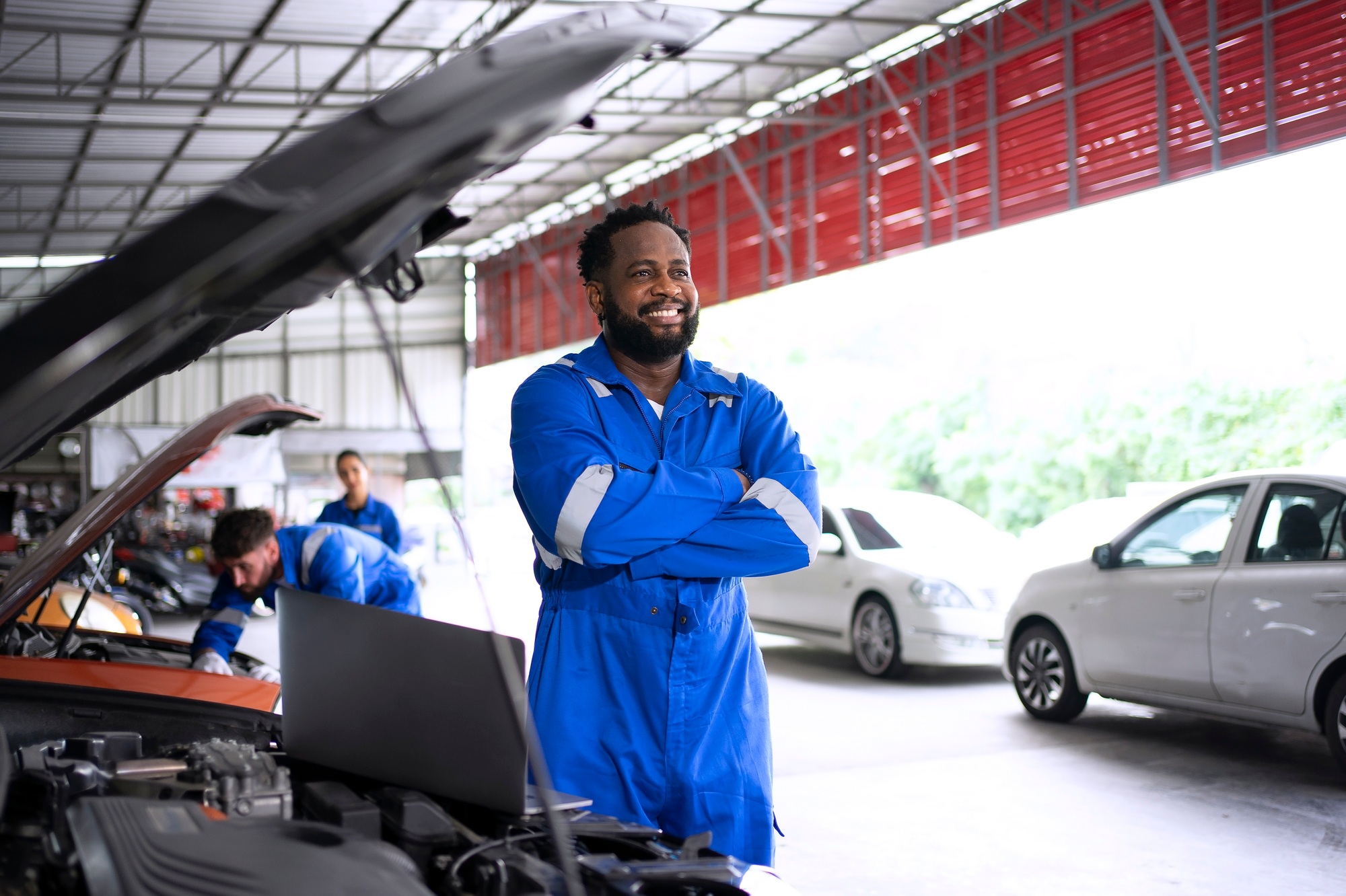 Mechanic work at auto repair shop.