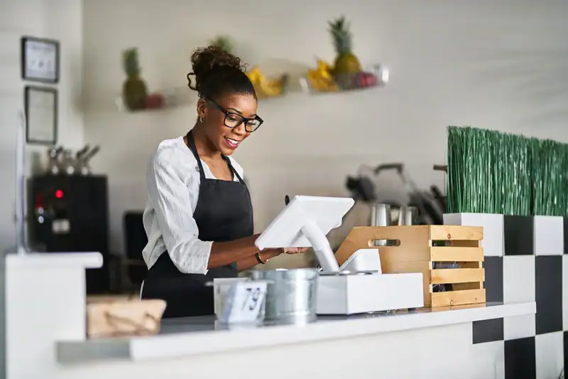 Restaurant manager reviewing campaign