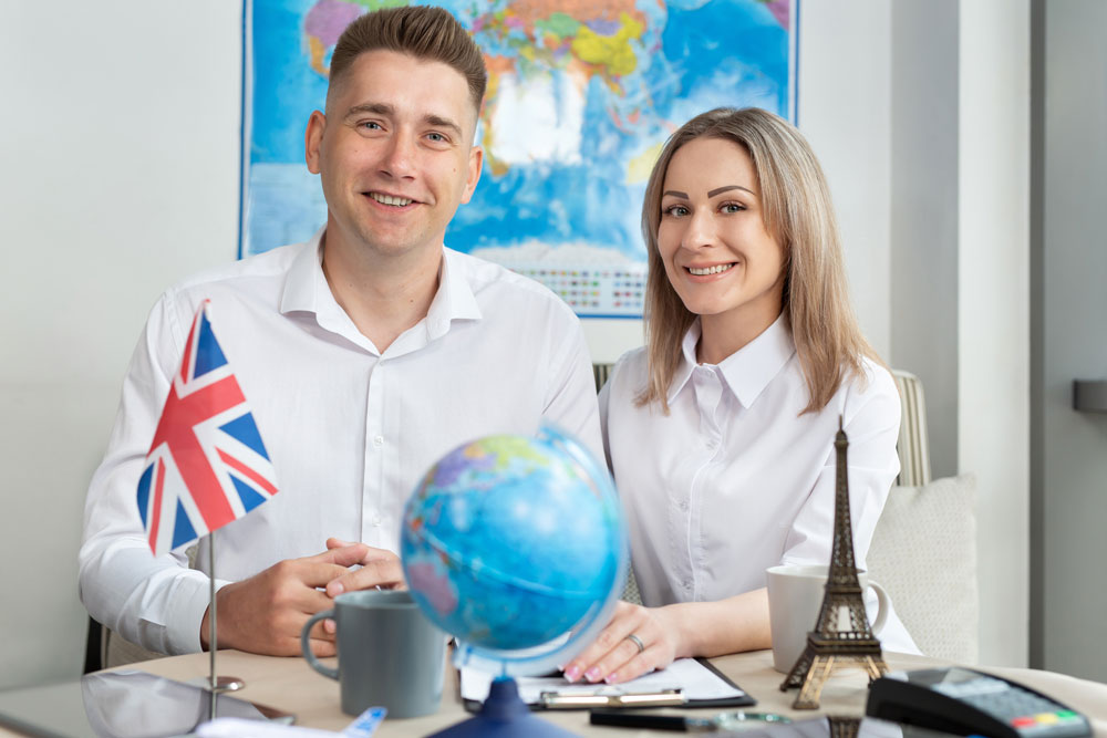young-couple-in-a-tour-agency-communication-with-a-2025-01-10-20-39-06-utc young-couple-in-a-tour-agency-communication-with-a-2025-01-10-20-39-06-utc